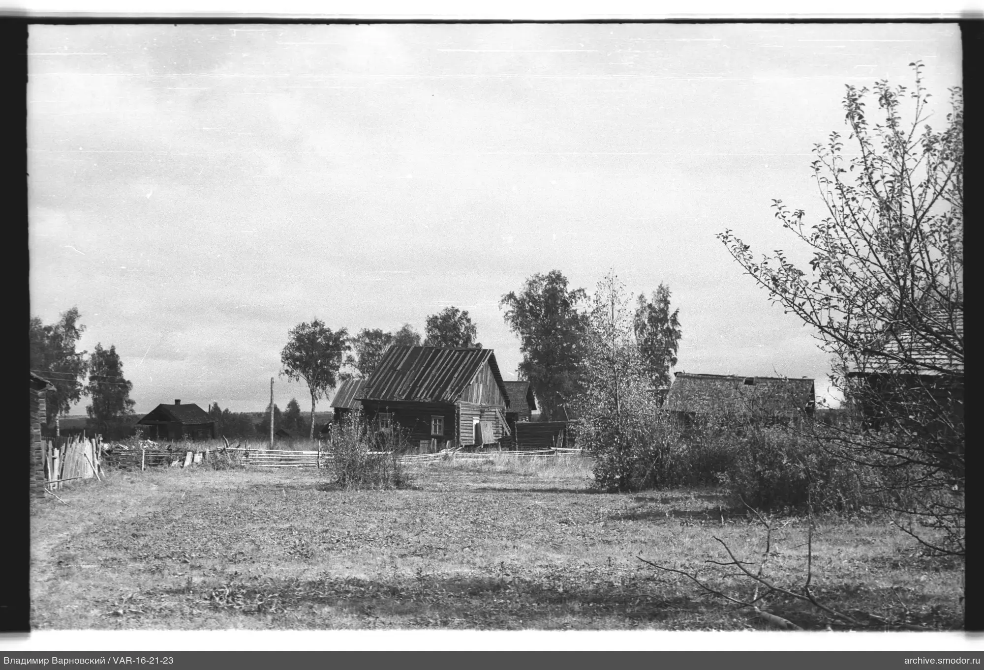 Wooden houses in a field