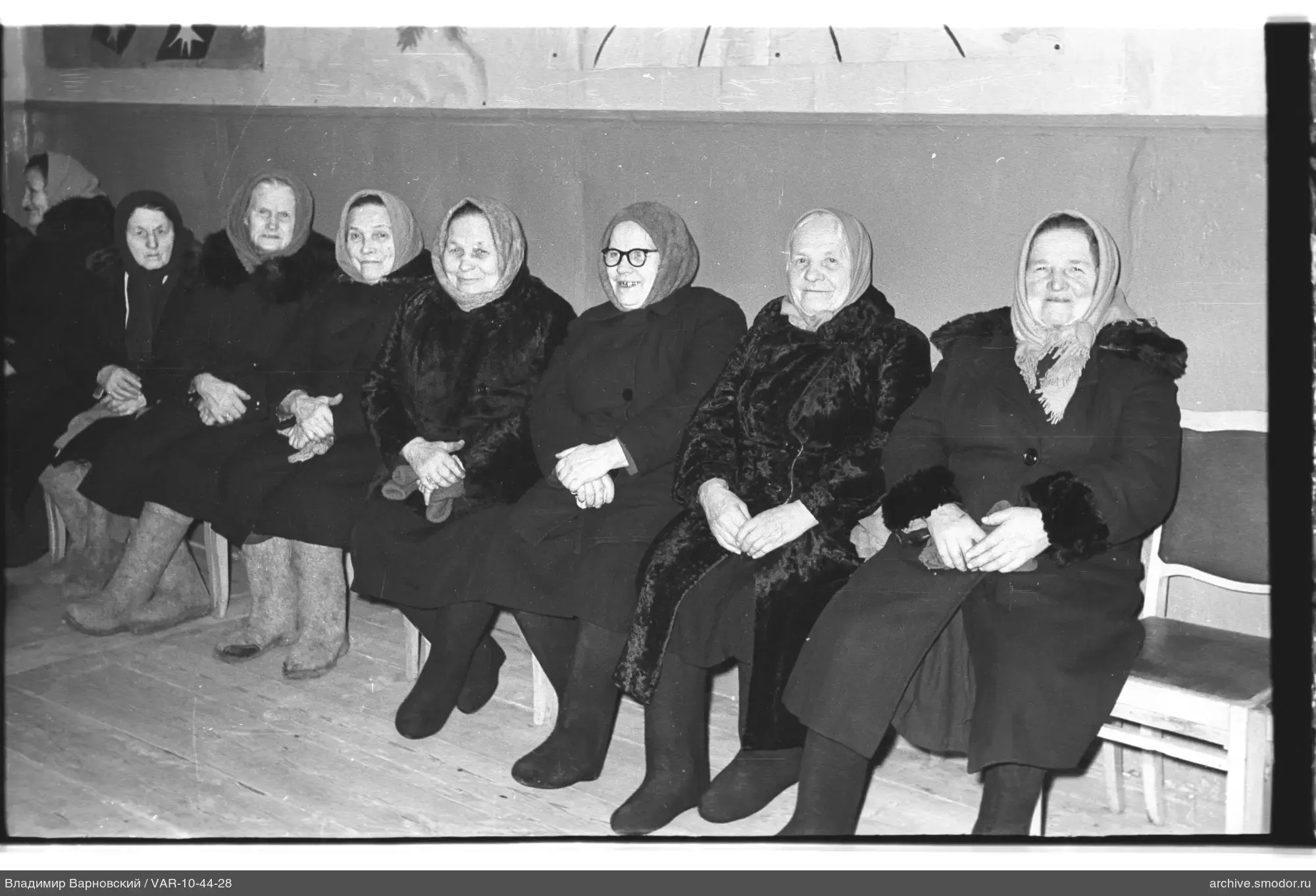 Group of elderly women sitting on a bench