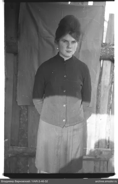 Portrait of a woman in cardigan and skirt