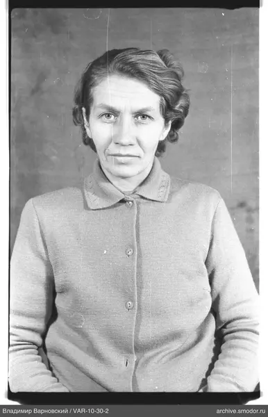 Portrait of a woman in a light cardigan