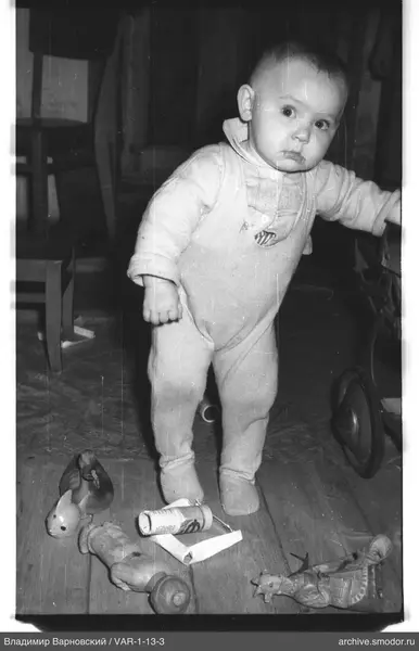Child with toys and furniture