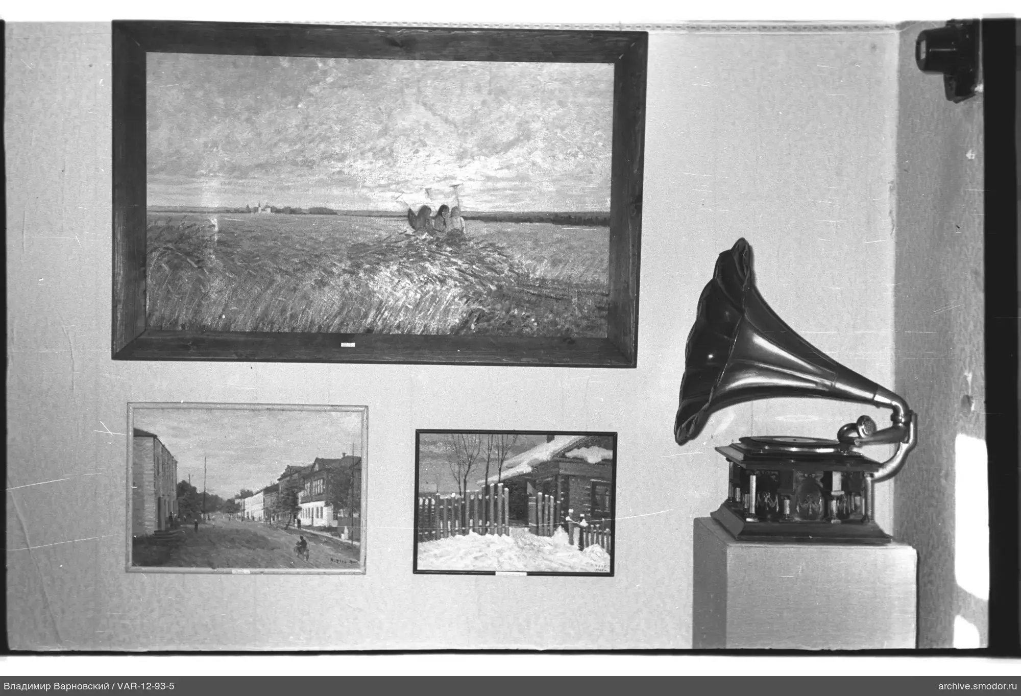 Paintings and gramophone on the wall