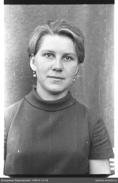Portrait of a woman in a dark sweater