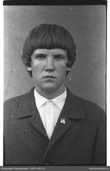 Portrait of a man with a "Moscow" badge