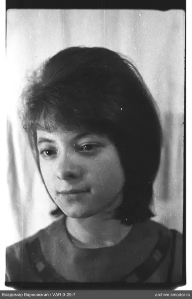 Bust portrait of a woman with dark hair