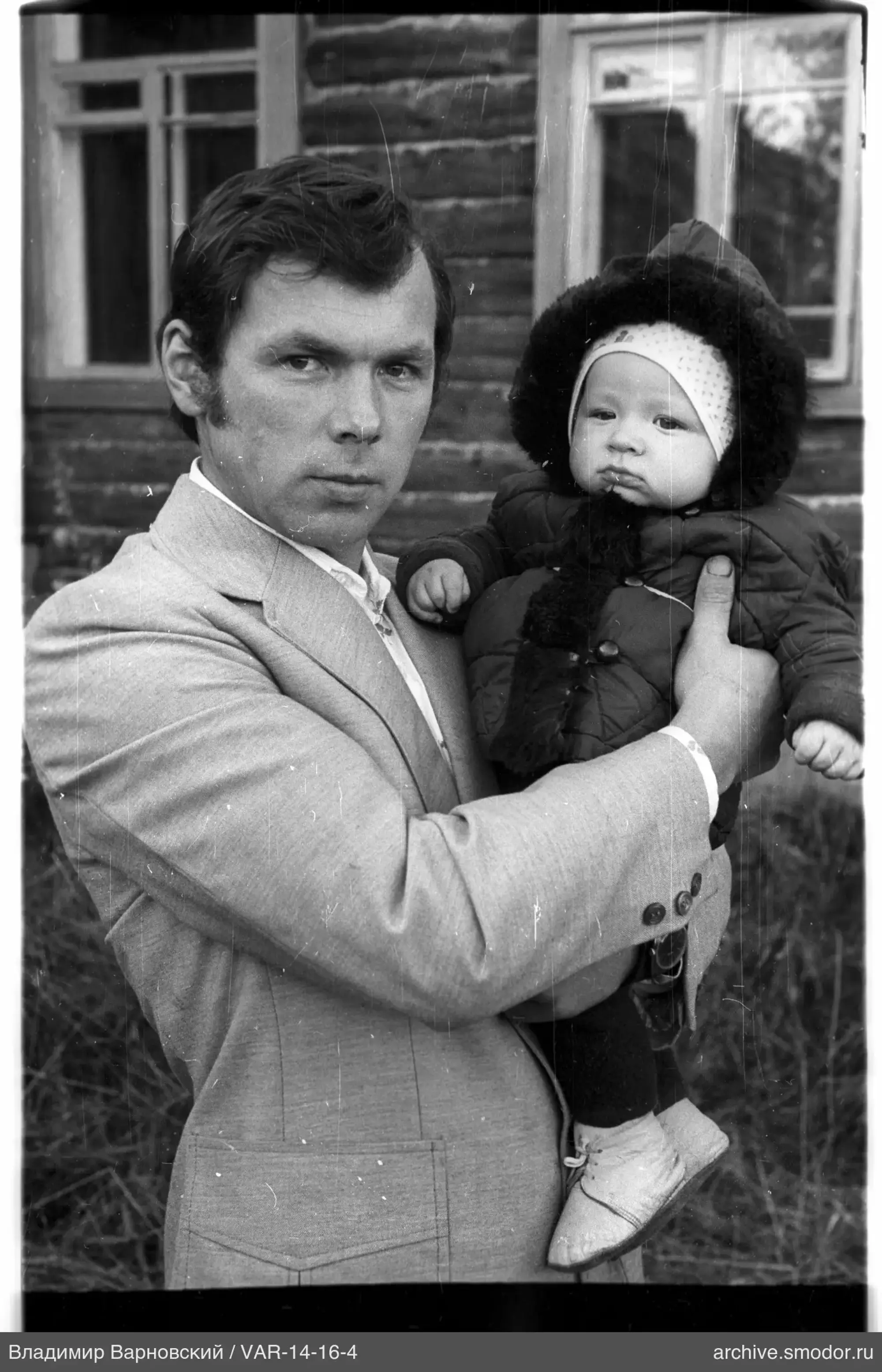 Portrait of a man and a child