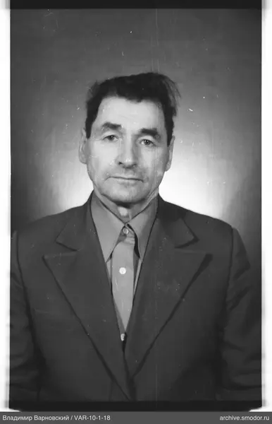 Portrait of a man in a dark jacket