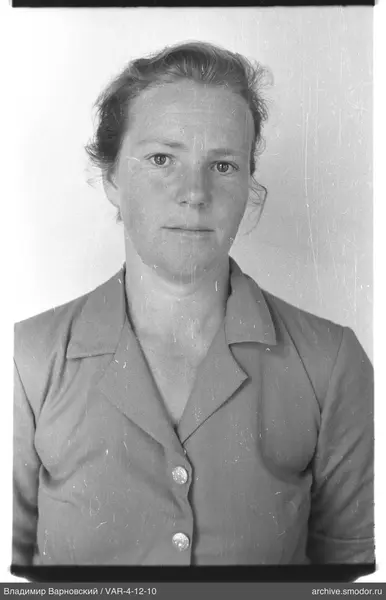 Portrait of a woman with pulled-back hair