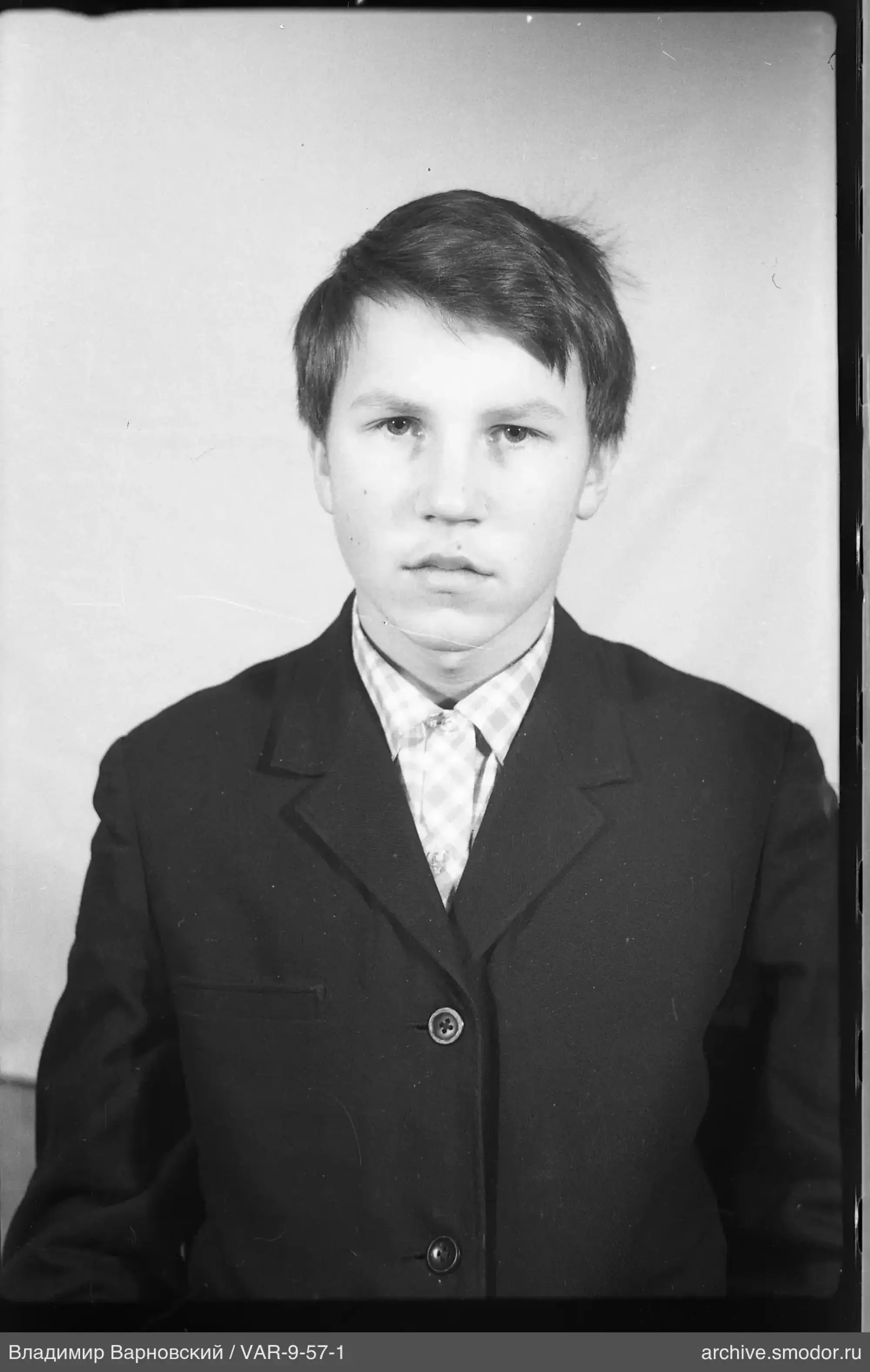 Boy's portrait in jacket and shirt