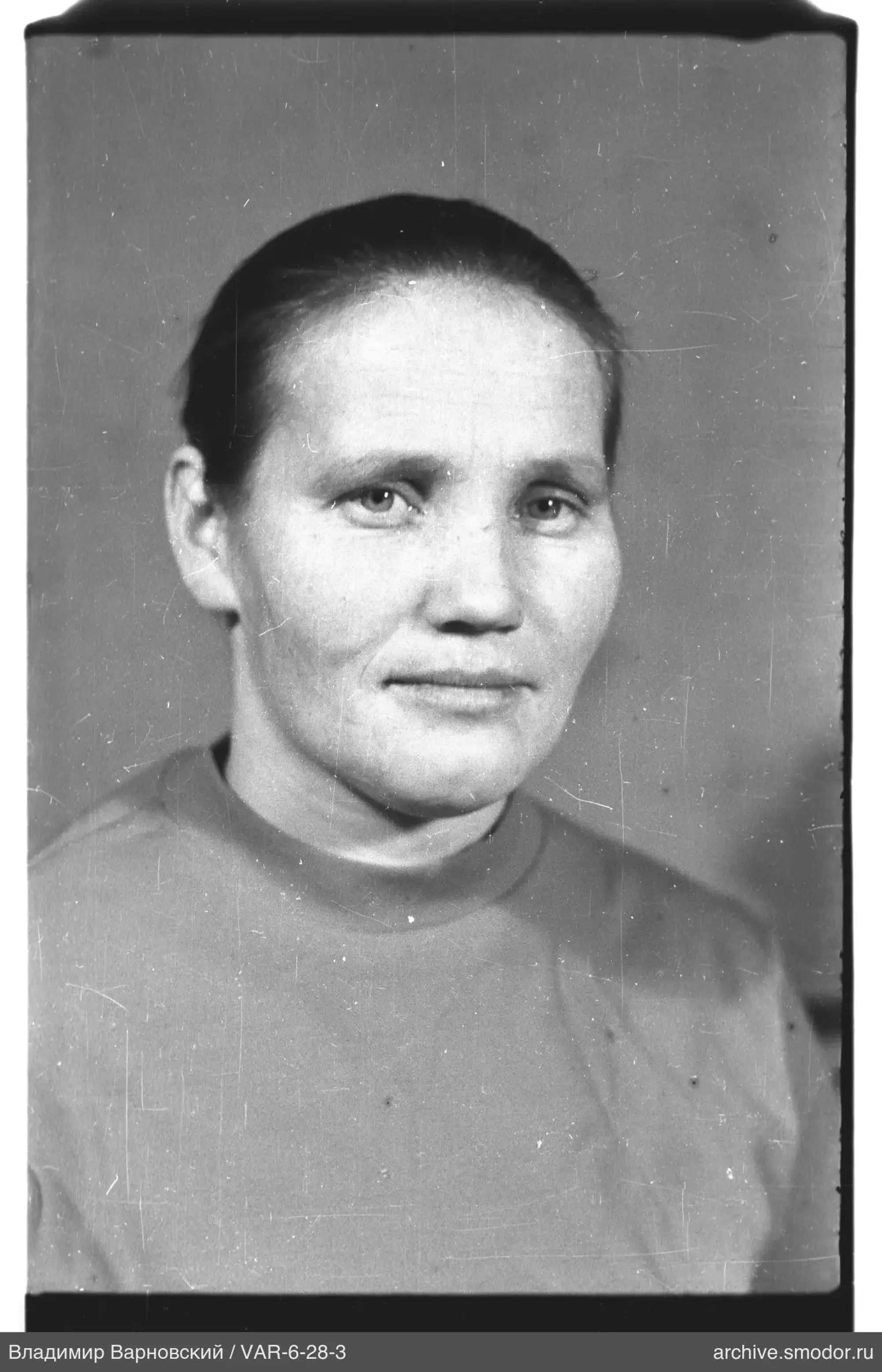 Portrait of a woman with a high collar