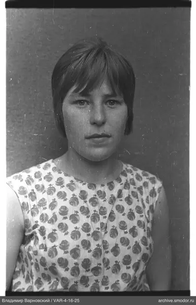 Portrait of a woman in a light top