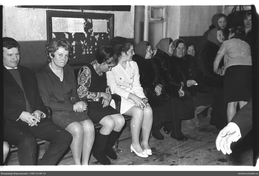 Group of women and a man in a room