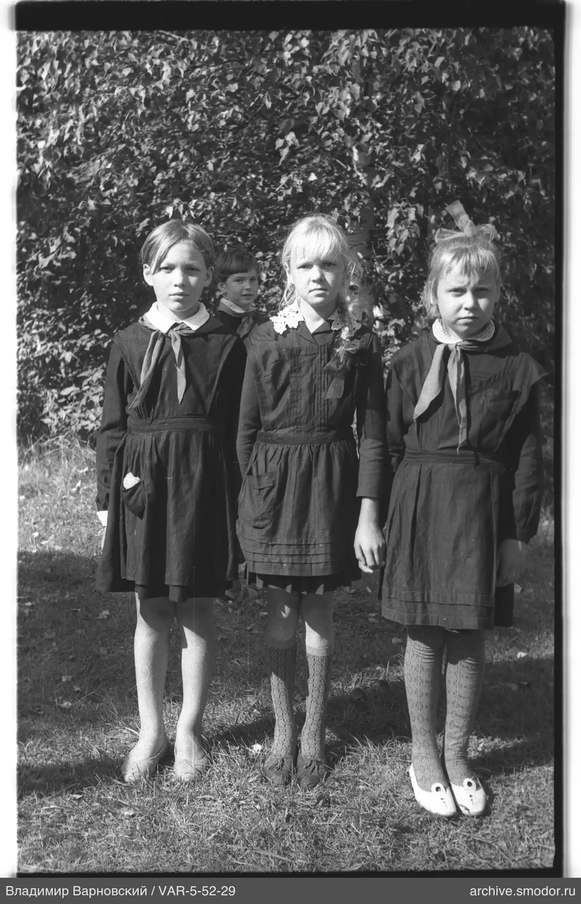 Group portrait of girls in school uniforms