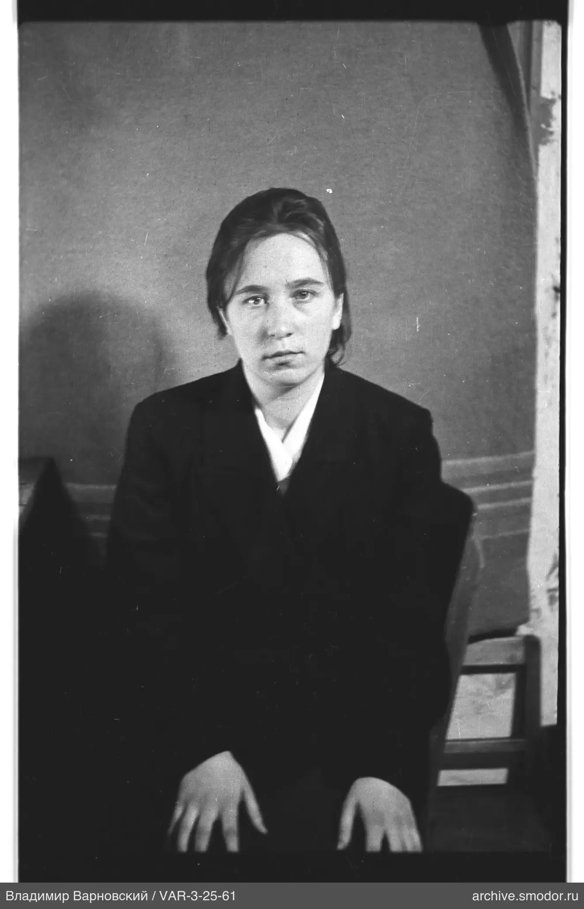 Portrait of a woman with pulled-back hair