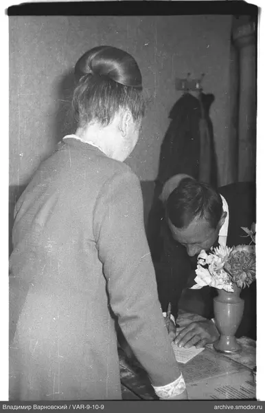 Man writing at the table