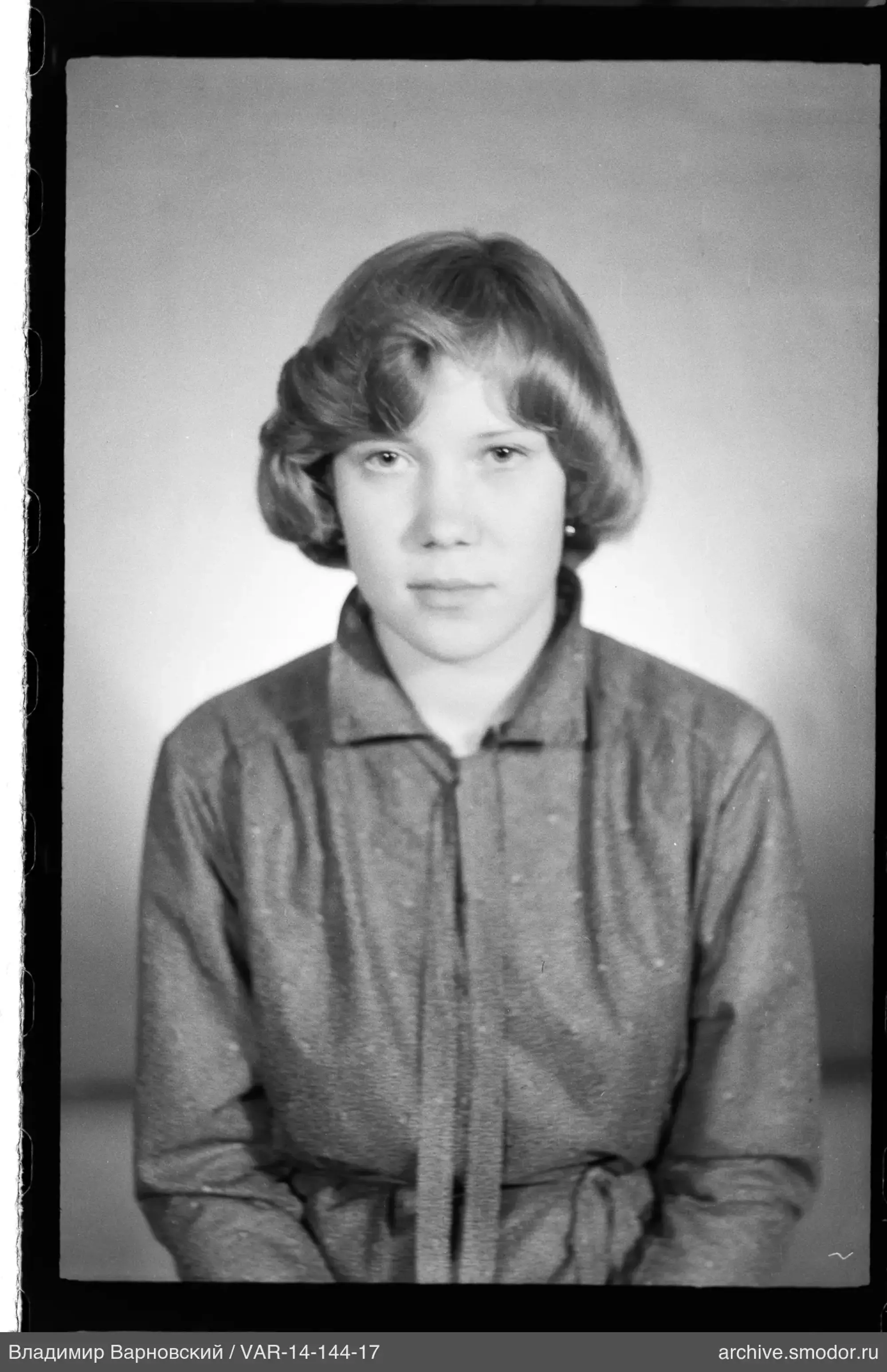 Portrait of a woman in a light shirt