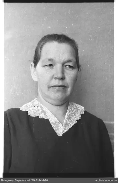 Portrait of a woman with pulled-back hair