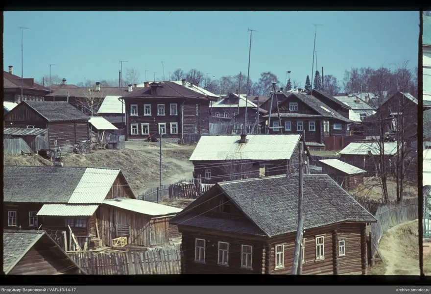 Wooden houses with different roofs