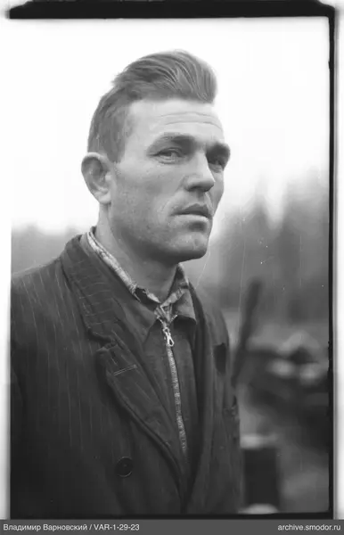 Portrait of a man in a striped jacket