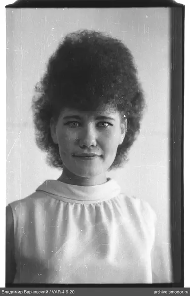 Portrait of a woman with curly hair