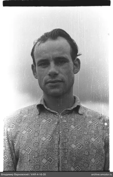 Portrait of a man in a patterned shirt
