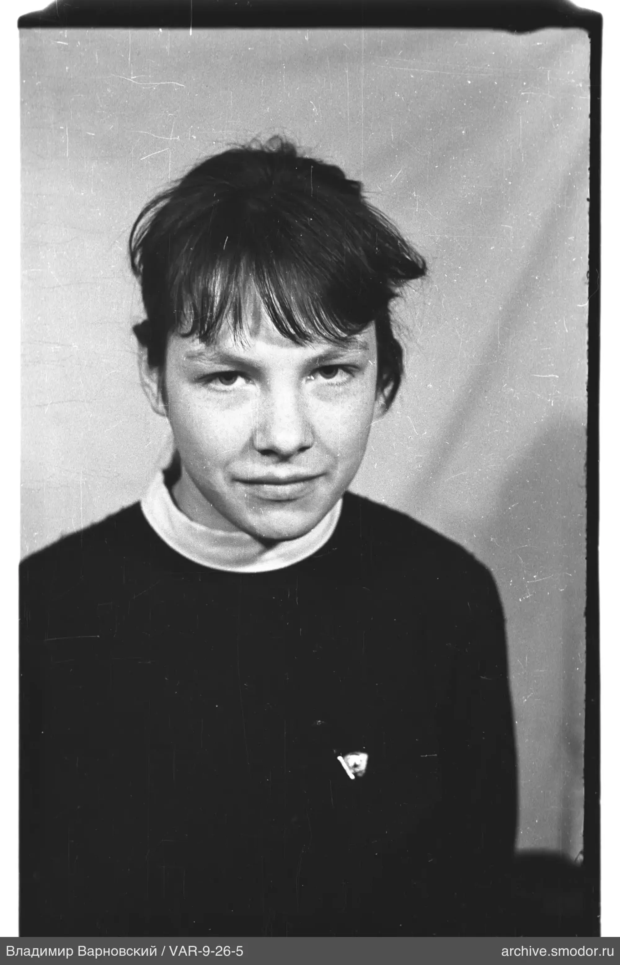 Portrait of a woman in sweater and turtleneck