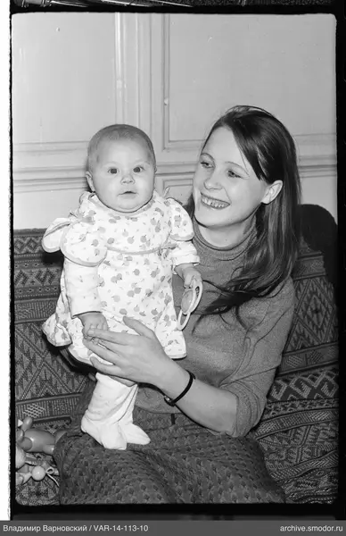 Woman and child on sofa