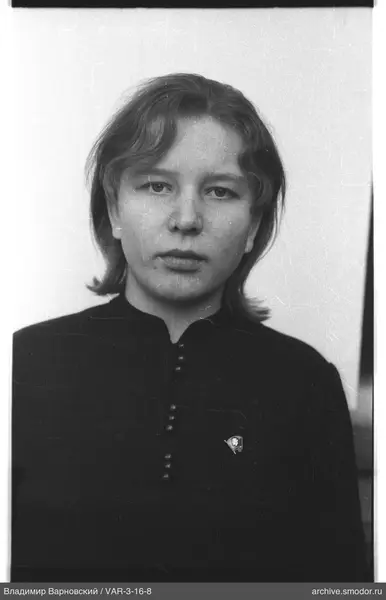 Portrait of a woman in dark clothing