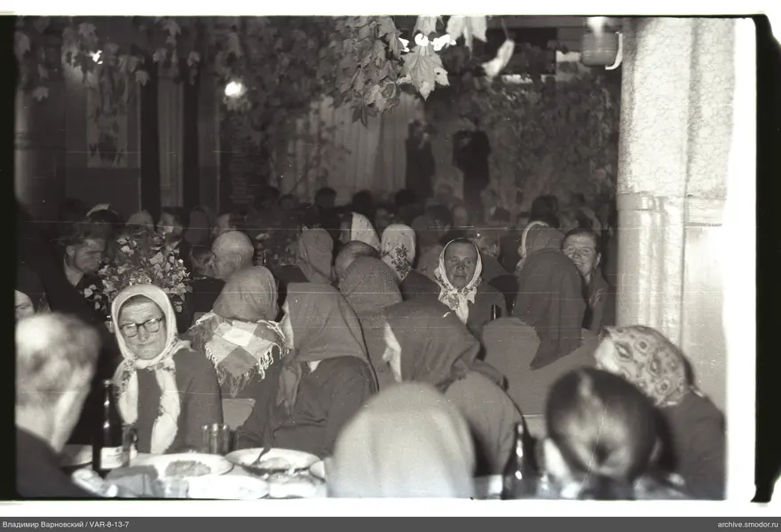 People sitting at tables during the event