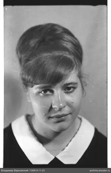 Portrait of a woman in a dark dress