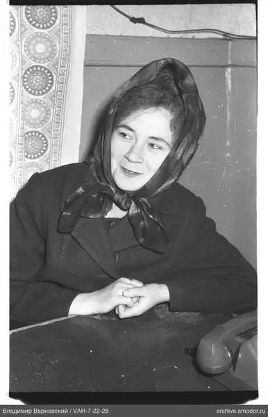 Portrait of a woman with a headscarf