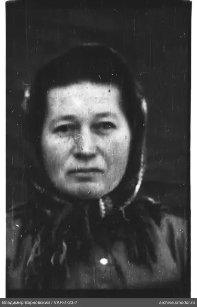 Portrait of a woman with a headscarf