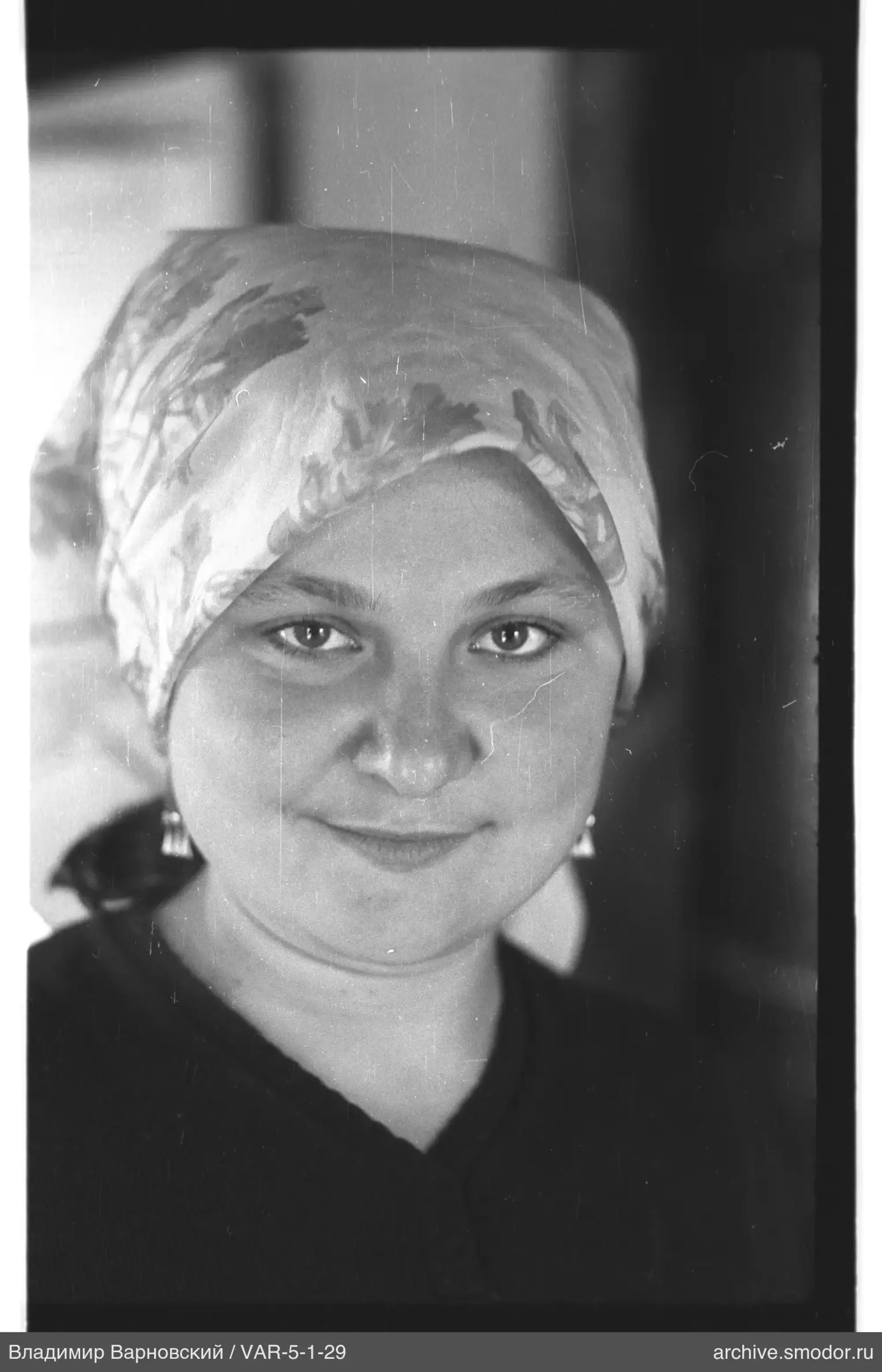 Portrait of a woman in a headscarf