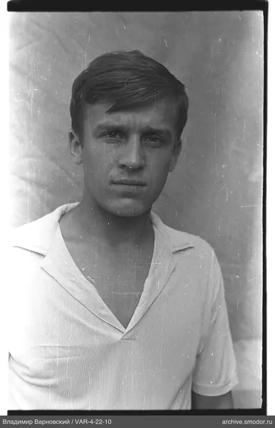 Portrait of a man in a light shirt