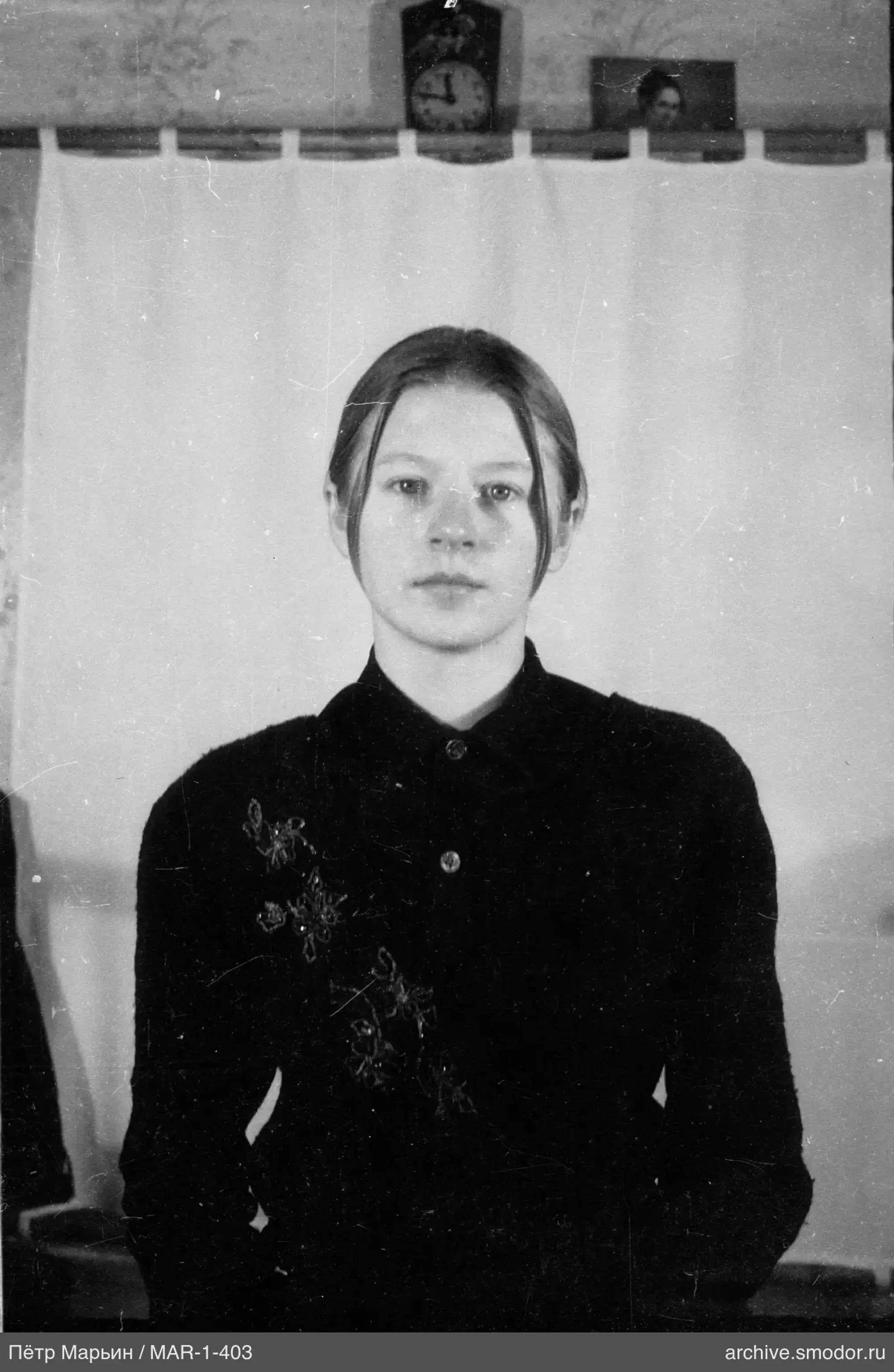 Portrait of a woman with embroidered shirt