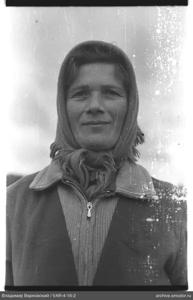 Portrait of a woman with a headscarf