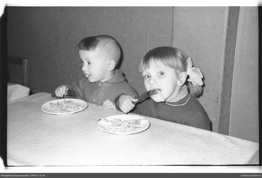 Two children at a table