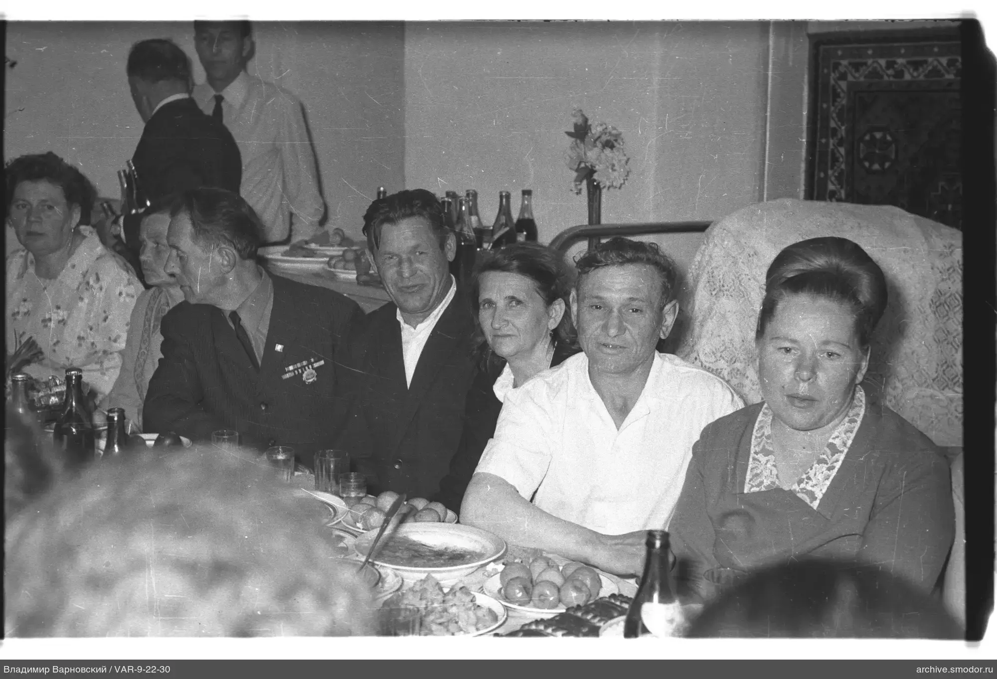 Group sitting at a table with snacks