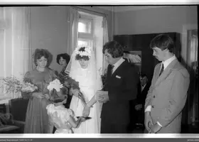 Wedding scene with woman in wreath