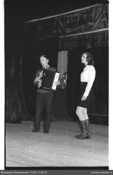 Man playing bayan on stage