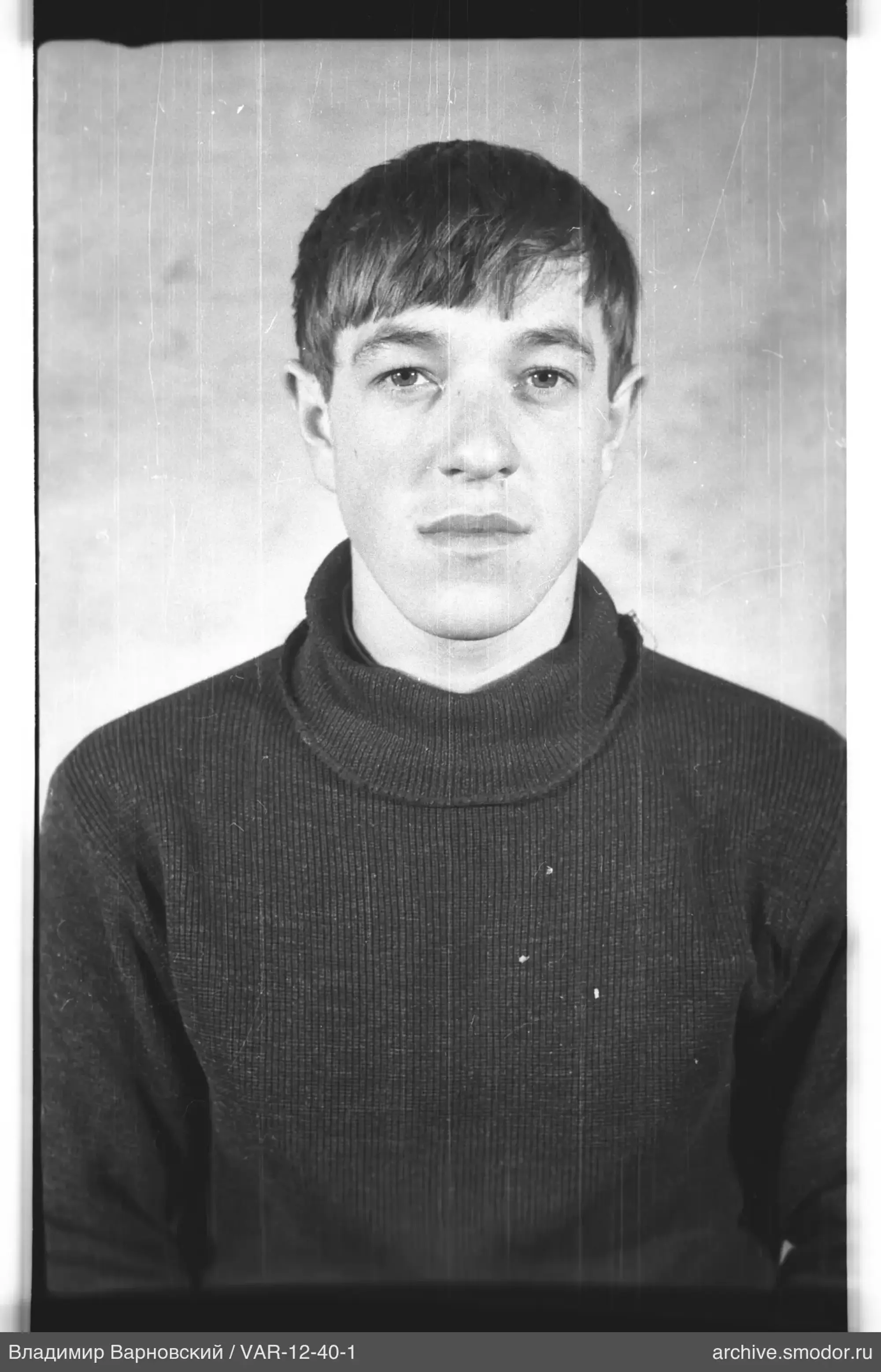 Portrait of a man in a dark sweater