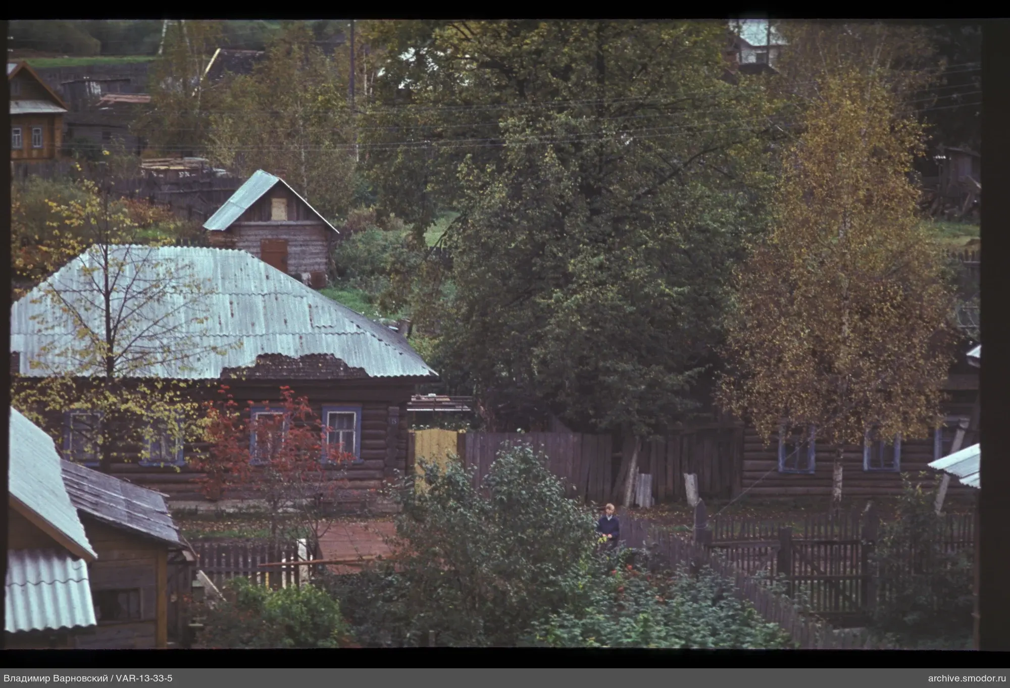 Деревянные дома с металлическими крышами