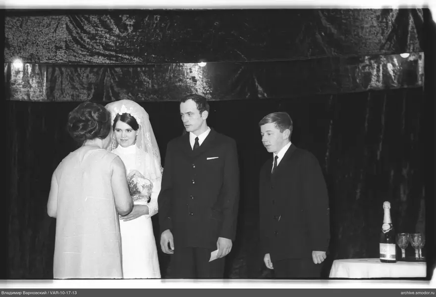 Group photo with woman in white dress