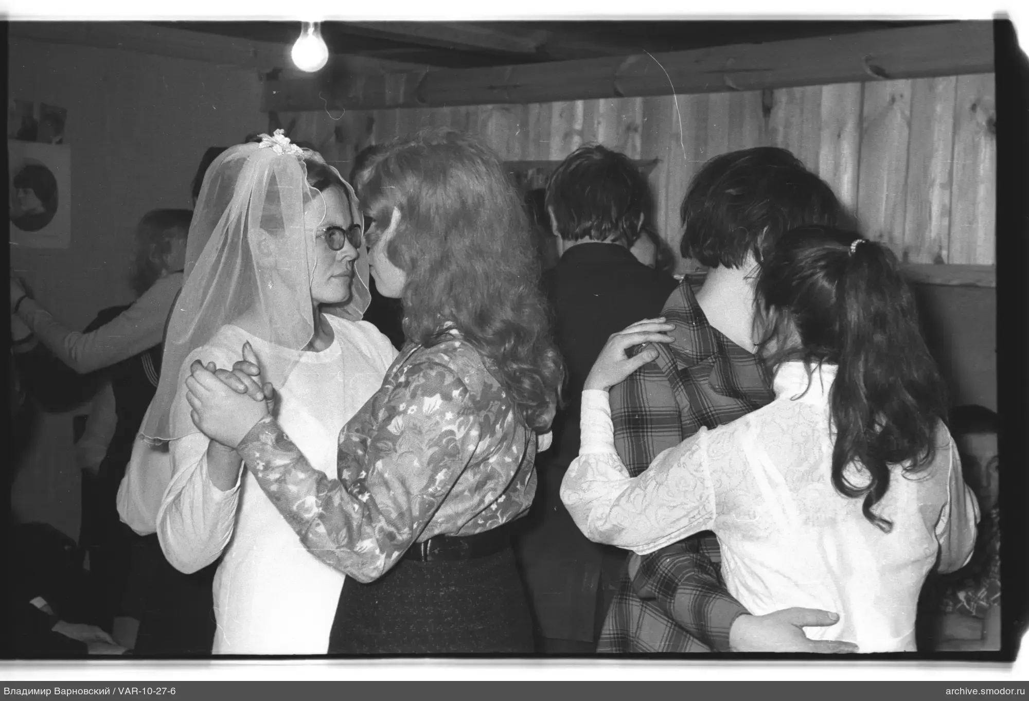 Dancing couples at an event
