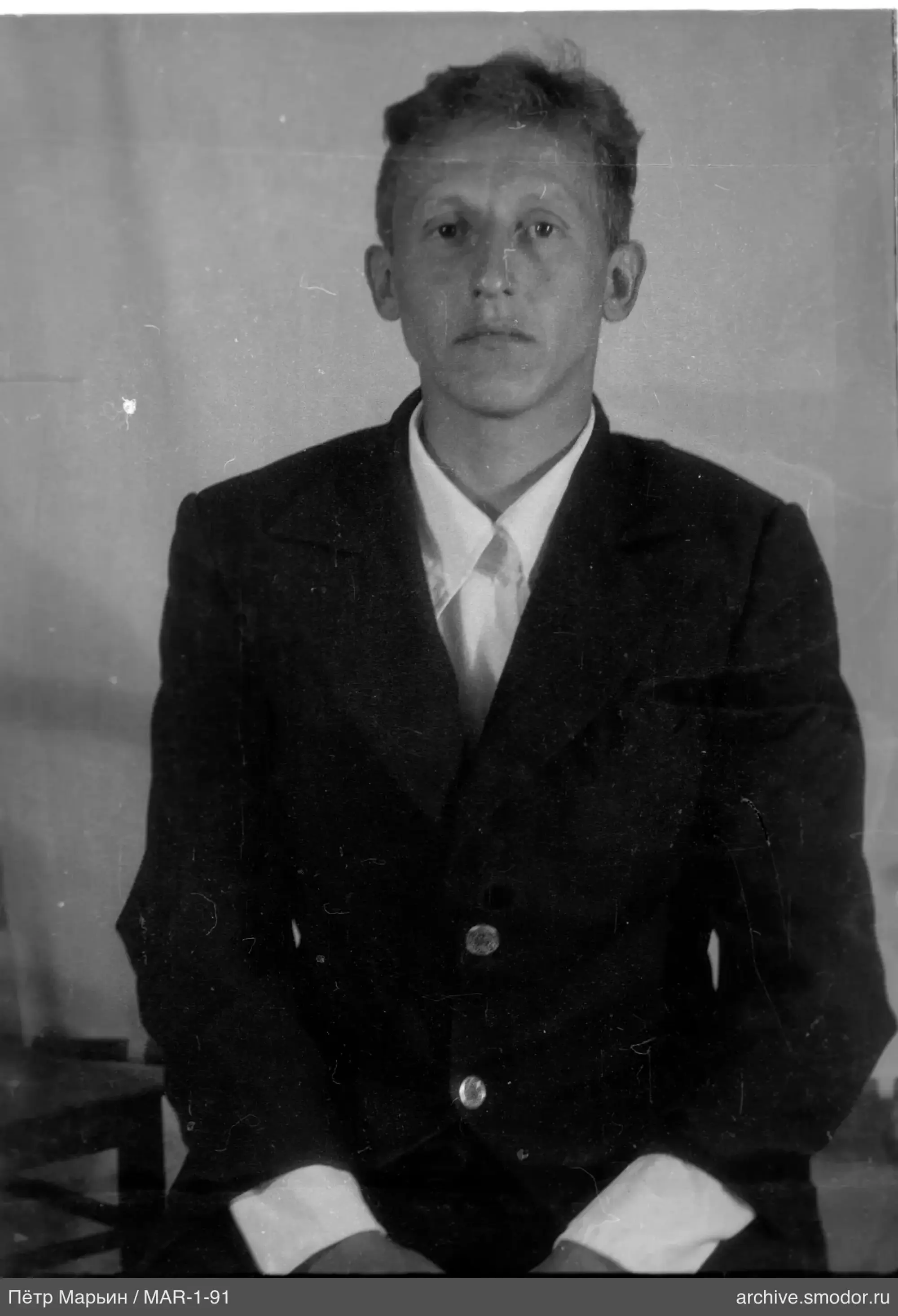 Portrait of a man in a jacket and shirt