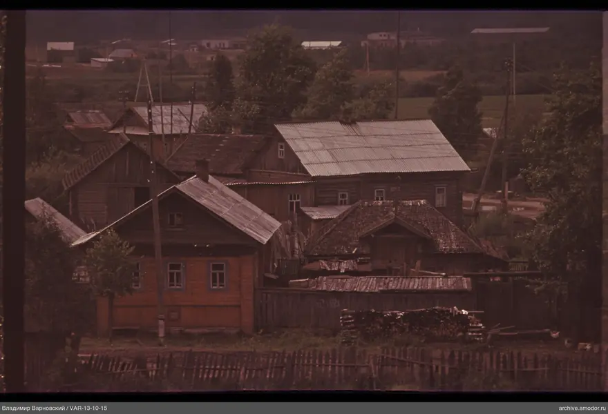 Several wooden houses with different roofs