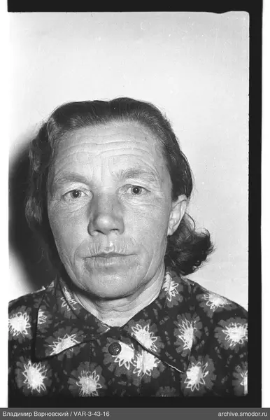 Portrait of a woman in a floral shirt