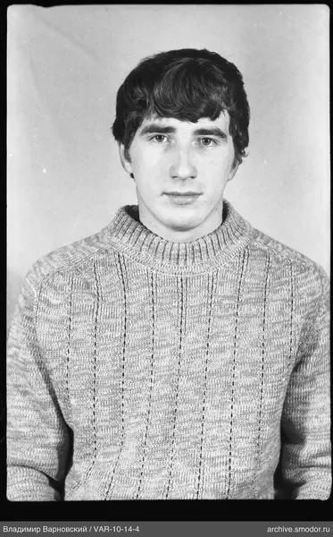 Portrait of a man in a light sweater