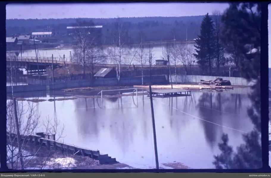 Flooded sports ground with football goals