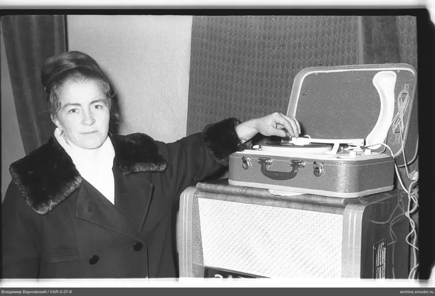 Woman with record player